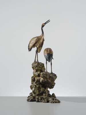 Lot 9 - MASAMITSU: AN IMPRESSIVE SILVER-PATINATED BRONZE OKIMONO OF TWO CRANES ON A ROCK