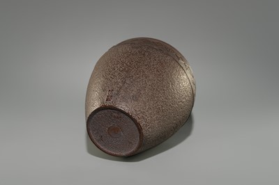 A LARGE IRON VASE WITH GEOMETRIC DECORATION