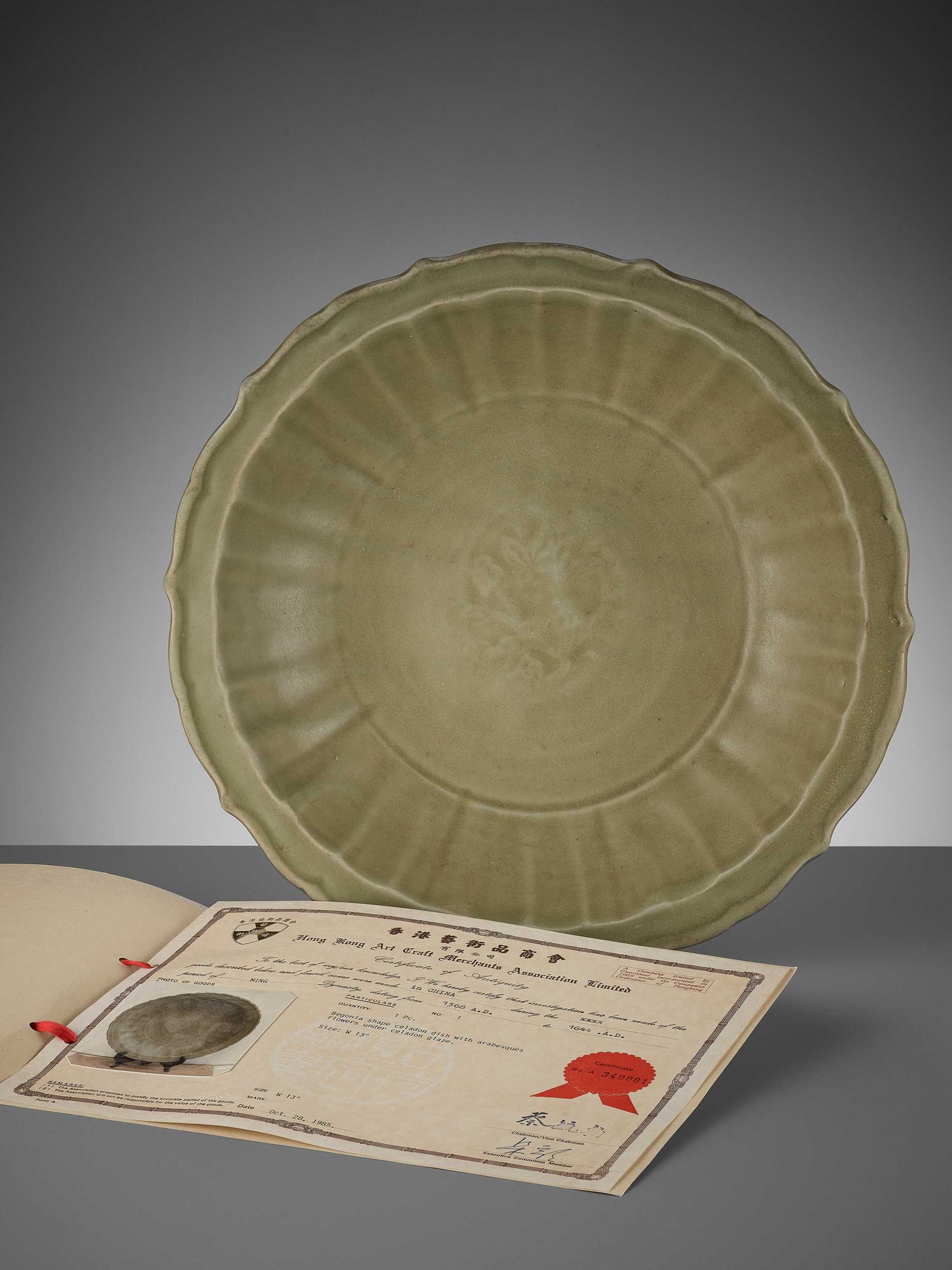 Lot 205 - A LOBED LONGQUAN CELADON-GLAZED BARBED-RIM CHARGER, MING