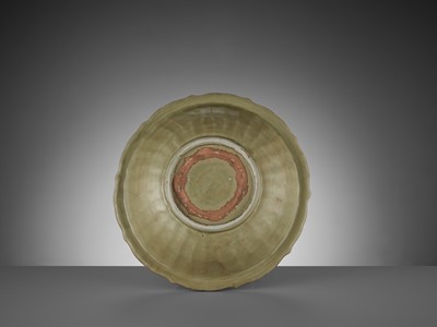 Lot 205 - A LOBED LONGQUAN CELADON-GLAZED BARBED-RIM CHARGER, MING
