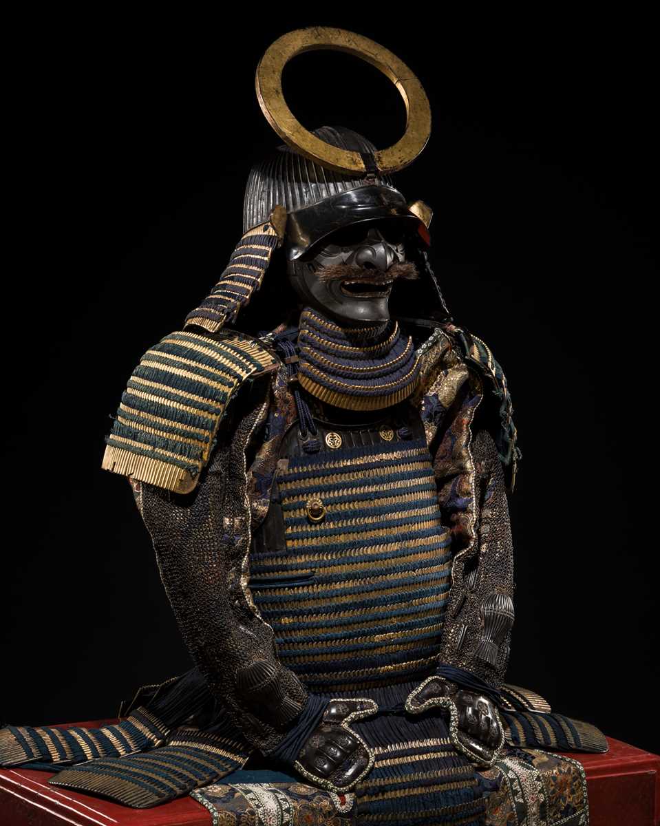 A FINE NIMAI OKEGAWA DO GUSOKU (TWO-PIECE CUIRASS ARMOR) WITH A BLACK-LACQUERED IRON SUJIBACHI KABUTO AND RESSEI MENPO