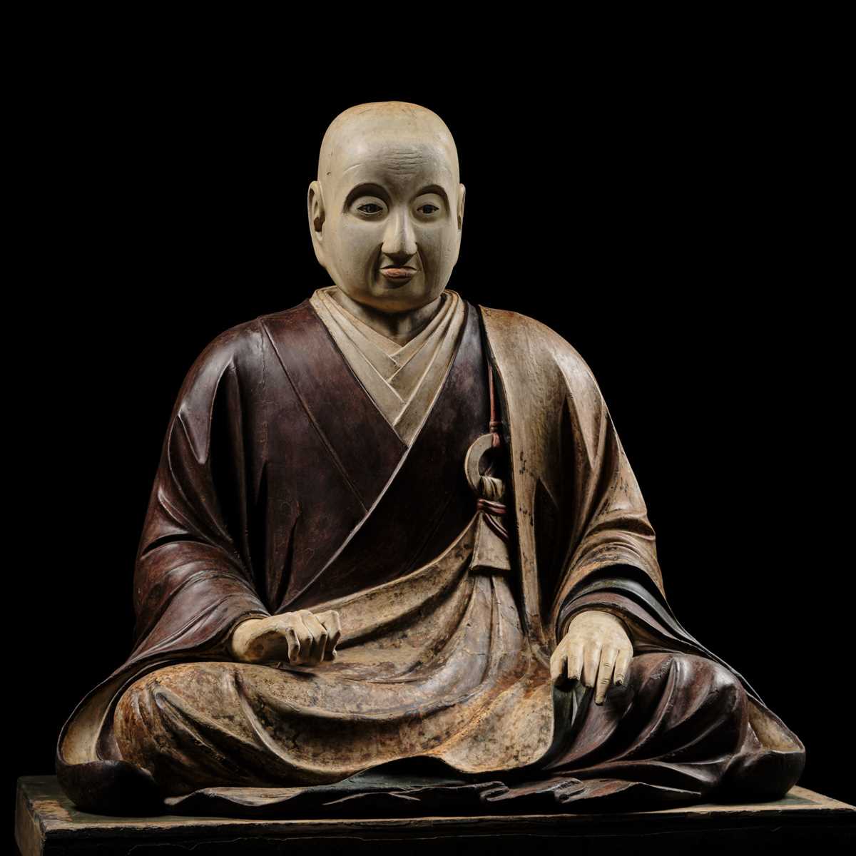 Lot 163 - A LARGE AND EARLY POLYCHROME-LACQUERED WOOD FIGURE OF A PRIEST, KAMAKURA PERIOD, THE DATING CONFIRMED BY A C14 TEST