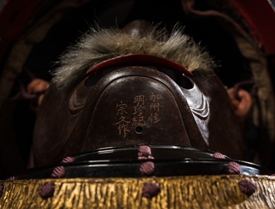 Lot 112 - AN IMPRESSIVE PURPLE LACED KAGA STYLE SUIT OF ARMOR WITH SAKAI CLAN MON AND AN IRON ZABOSHI KABUTO AND MYOCHIN MENPO