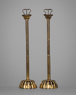 Lot 121 - A LARGE PAIR OF GILT AND BLACK LACQUERED CANDLESTICKS
