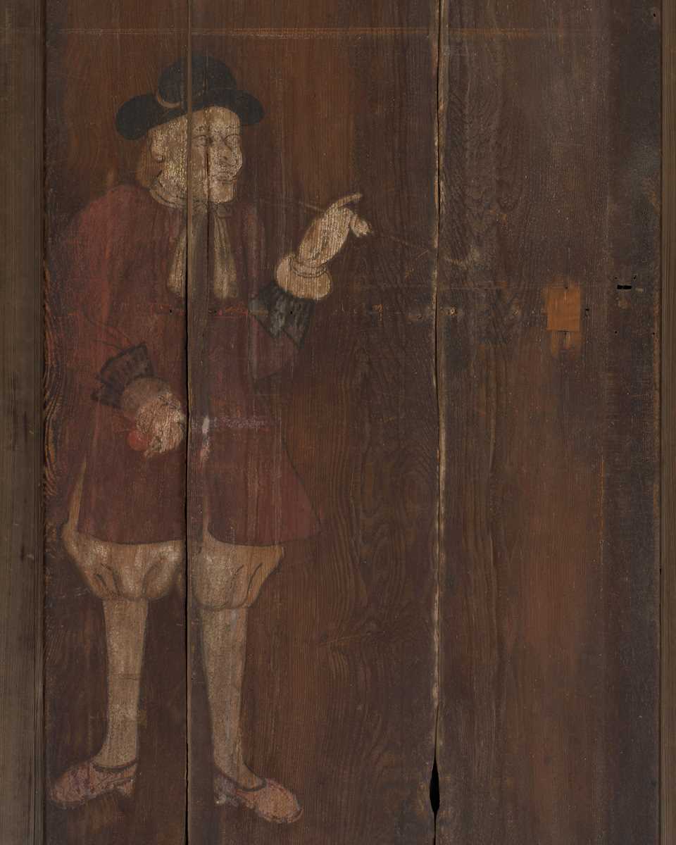 A PAINTED WOOD DOOR DEPICTING A DUTCHMAN