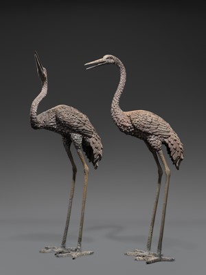 A PAIR OF LARGE BRONZE FIGURES OF CRANES