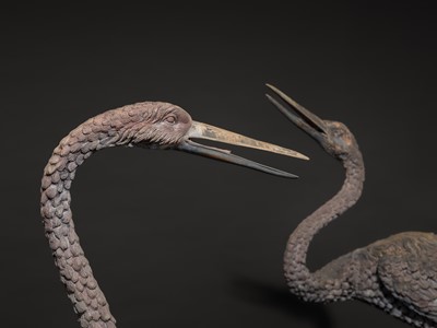 A PAIR OF LARGE BRONZE FIGURES OF CRANES