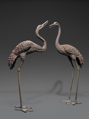 A PAIR OF LARGE BRONZE FIGURES OF CRANES