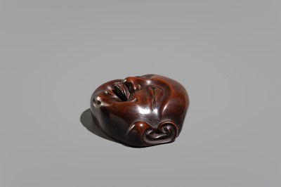A WOOD MASK DEPICTING HOTEI