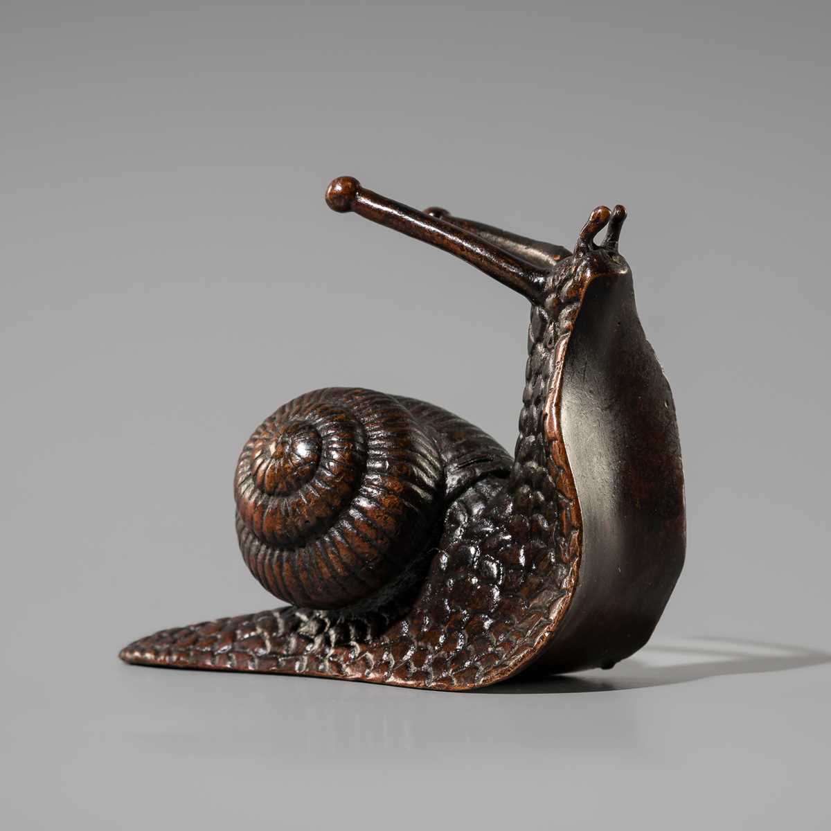 Lot 5 - A SIGNED BRONZE OKIMONO OF A SNAIL