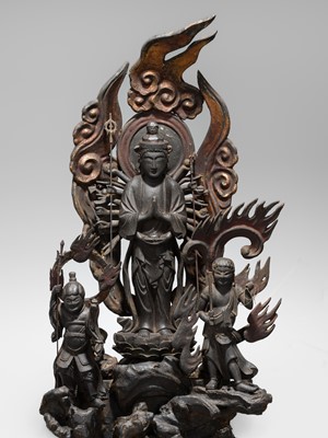 A LACQUERED WOOD FIGURE WITH A TRIAD OF KANNON BOSATSU AND ACOLYTES