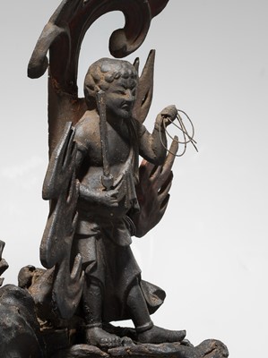A LACQUERED WOOD FIGURE WITH A TRIAD OF KANNON BOSATSU AND ACOLYTES