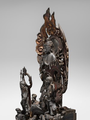 A LACQUERED WOOD FIGURE WITH A TRIAD OF KANNON BOSATSU AND ACOLYTES