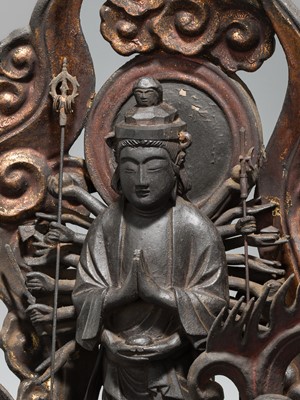 A LACQUERED WOOD FIGURE WITH A TRIAD OF KANNON BOSATSU AND ACOLYTES