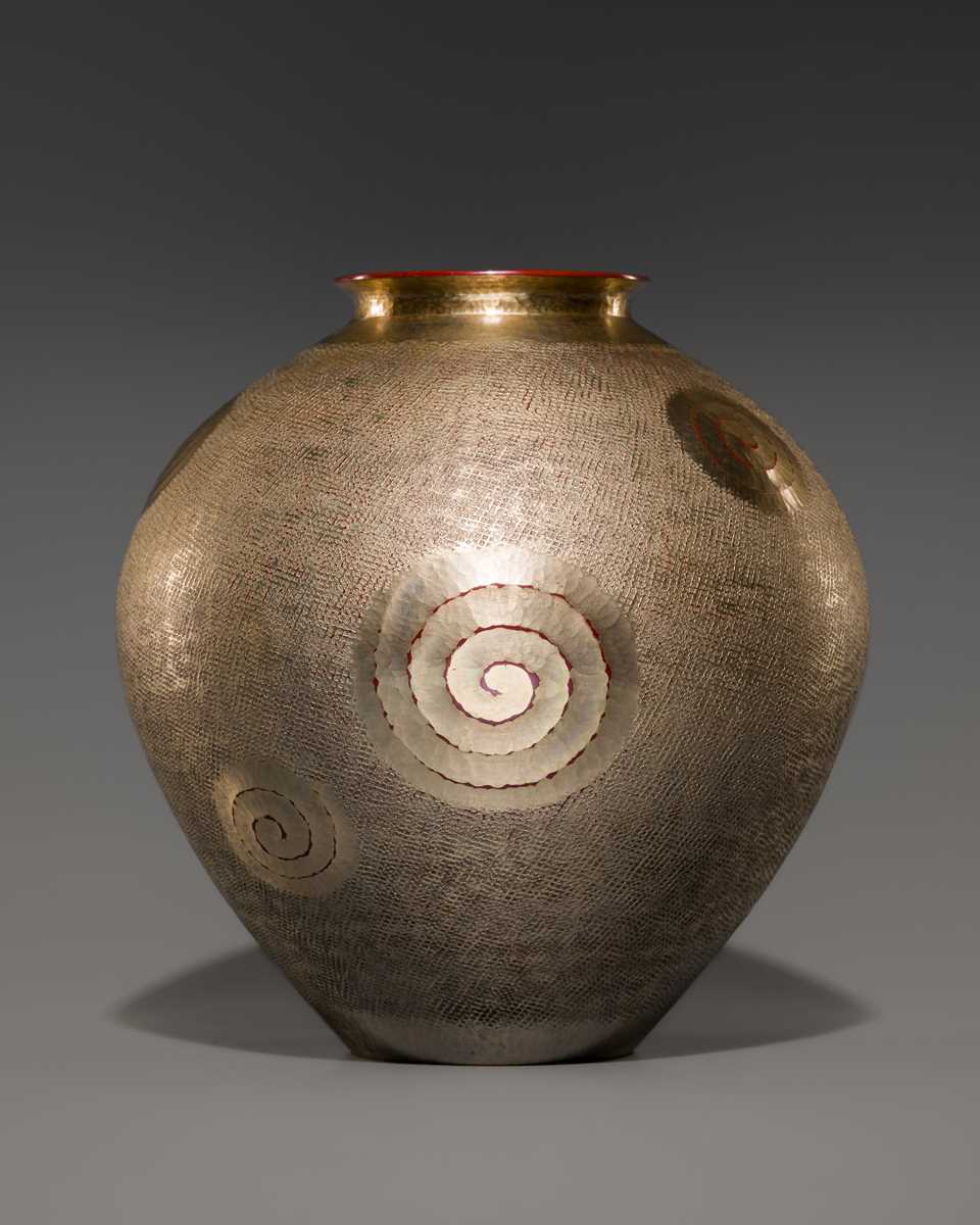 Lot 44 - GYOKUSENDO: A HAMMERED AND SILVER PATINATED SUAKA (COPPER) VASE