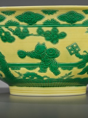 Lot 245 - AN INCISED YELLOW AND GREEN-GLAZED 'EIGHT BOYS' BOWL, YONGZHENG MARK AND PERIOD
