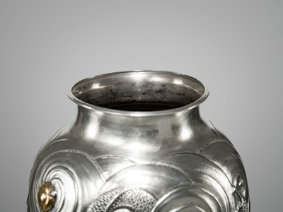 Lot 22 - KAWASHIMA TOSHU: A SUPERB AND LARGE GOLD-INLAID UCHIDASHI (REPOUSSÉ) SILVER ‘DRAGON’ VASE