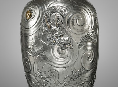 Lot 22 - KAWASHIMA TOSHU: A SUPERB AND LARGE GOLD-INLAID UCHIDASHI (REPOUSSÉ) SILVER ‘DRAGON’ VASE
