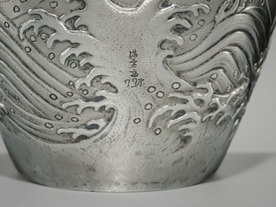 Lot 22 - KAWASHIMA TOSHU: A SUPERB AND LARGE GOLD-INLAID UCHIDASHI (REPOUSSÉ) SILVER ‘DRAGON’ VASE