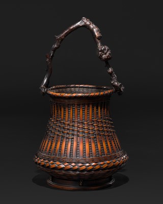 Lot 79 - A BAMBOO AND RATTAN ‘IKEBANA‘ HANAKAGO (FLOWER BASKET) WITH A WISTERIA ROOT HANDLE