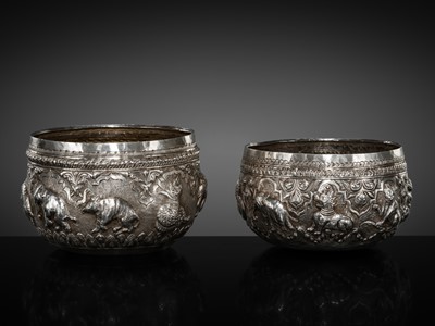 Lot 453 - A FINE PAIR OF EMBOSSED SILVER BOWLS, BURMA, 19TH CENTURY