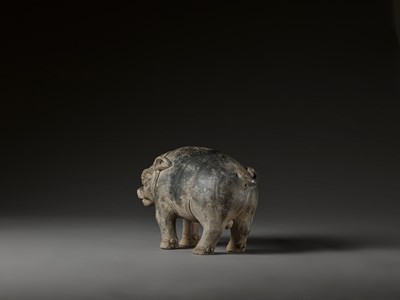 Lot 712 - A MASSIVE AND RARE EAST JAVANESE TERRACOTTA FIGURE OF A BOAR, MAJAPAHIT