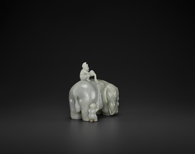 Lot 71 - A CELADON JADE ‘WASHING THE ELEPHANT’ CARVING, QING