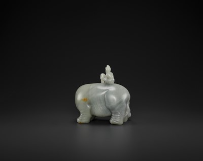 Lot 71 - A CELADON JADE ‘WASHING THE ELEPHANT’ CARVING, QING