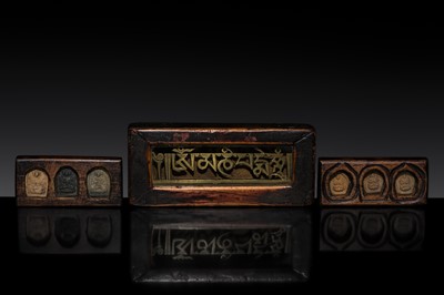 Lot 168 - A GROUP OF TWO CLAY TSA-TSA SETS AND A BRONZE MANTRA PLAQUE, 18TH-19TH CENTURY