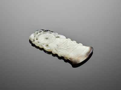 Lot 46 - A BLACK AND WHITE JADE ‘ARCHAISTIC’ AXE-FORM OPENWORK PENDANT, 18TH CENTURY
