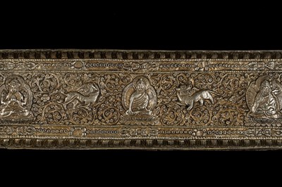 Lot 104 - A RARE AND IMPORTANT WOOD AND SILVER REPOUSSÉ SUTRA COVER AND MANUSCRIPT, 18TH-19TH CENTURY