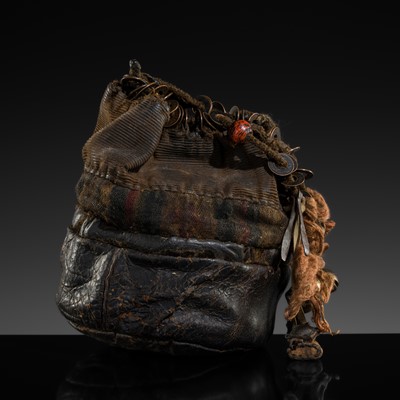 Lot 183 - A SHAMANIC LEATHER PURSE, NORTHEASTERN INDIA, 20TH CENTURY AND EARLIER