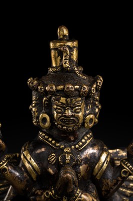 Lot 109 - A RARE PARCEL-GILT COPPER VAJRAKILA PHURBA, 17TH CENTURY
