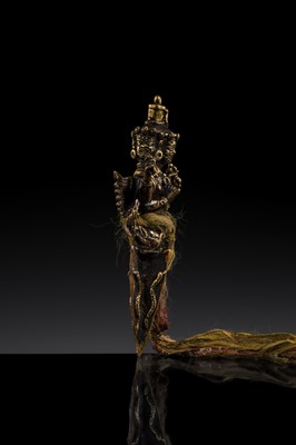 Lot 109 - A RARE PARCEL-GILT COPPER VAJRAKILA PHURBA, 17TH CENTURY