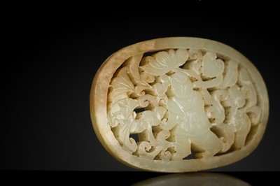 A WHITE AND RUSSET JADE PLAQUE WITH A HUMAN FIGURE AMONG FOLIAGE, LATE QING DYNASTY OR EARLIER