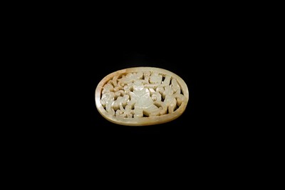 A WHITE AND RUSSET JADE PLAQUE WITH A HUMAN FIGURE AMONG FOLIAGE, LATE QING DYNASTY OR EARLIER