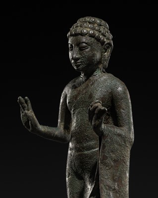 Lot 469 - A FINE BRONZE FIGURE OF BUDDHA SHAKYAMUNI, SAILENDRA KINGDOM, EAST JAVA, 9TH-10TH CENTURY
