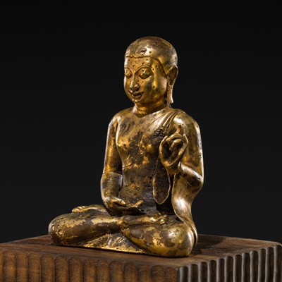 Lot 476 - A GILT-BRONZE FIGURE OF A BUDDHIST MONK (BHIKSU) IN MEDITATION, JAVA, MAJAPAHIT PERIOD, 13TH-15TH CENTURY