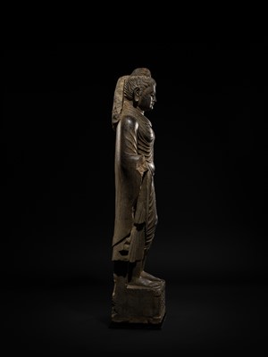 Lot 16 - A LARGE AND IMPORTANT POLISHED GRAY SCHIST FIGURE OF BUDDHA SHAKYAMUNI, ANCIENT REGION OF GANDHARA, SWAT VALLEY, 2ND-4TH CENTURY