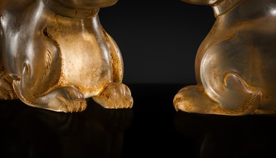 Lot 31 - AN EXCEPTIONALLY WELL CARVED PAIR OF ROCK CRYSTAL FELINE FIGURES, HAN DYNASTY