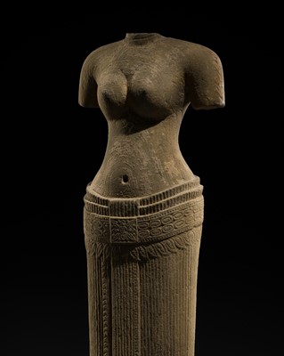 Lot 9 - A SANDSTONE TORSO OF A FEMALE DEITY, BAYON STYLE, ANGKOR PERIOD, LATE 12TH-13TH CENTURY