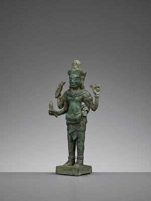 Lot 716 - A KHMER BRONZE FIGURE OF AVALOKITESHVARA, ANGKOR PERIOD