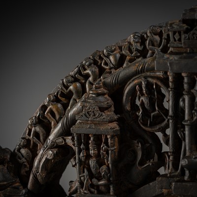 Lot 18 - A BLACK STONE ARCH FROM THE PRABHATORANA OF A VISHNU STELE, GAHADAVALA DYNASTY, INDIA, 11TH-12TH CENTURY