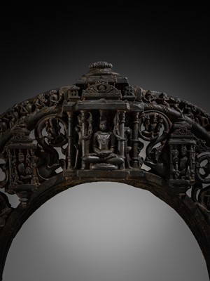 Lot 18 - A BLACK STONE ARCH FROM THE PRABHATORANA OF A VISHNU STELE, GAHADAVALA DYNASTY, INDIA, 11TH-12TH CENTURY