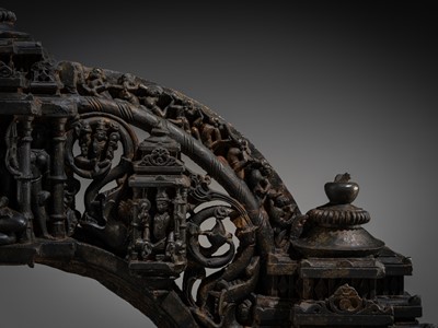 Lot 18 - A BLACK STONE ARCH FROM THE PRABHATORANA OF A VISHNU STELE, GAHADAVALA DYNASTY, INDIA, 11TH-12TH CENTURY