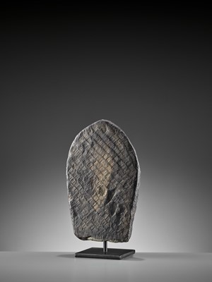 Lot 450 - A SINO-TIBETAN BLACK STONE FIGURE OF PANJARANATA MAHAKALA, 17TH CENTURY