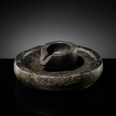 Lot 19 - A HINDU STONE YONI WITH AN ASSOCIATED RITUAL WATER BASIN