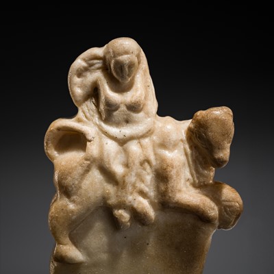 Lot 301 - A SMALL MARBLE CARVING OF EUROPA RIDING ZEUS TURNED INTO A BULL, HELLENISTIC-ROMAN PERIOD, CIRCA 1ST-2ND CENTURY OR EARLIER