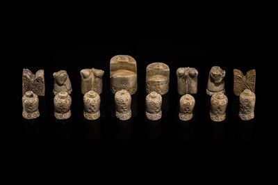 Lot 323 - A RARE SET OF 16 ANCIENT CHESS PIECES, MOST LIKELY GREATER MESOPOTAMIA OR PERSIA, CIRCA 11TH-12TH CENTURY