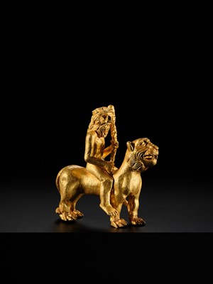 Lot 255 - AN EXCEEDINGLY RARE GOLD FIGURE OF HERCULES RIDING A LION, CENTRAL ASIA, PROBABLY BACTRIAN, CIRCA 1ST-2ND CENTURY AD